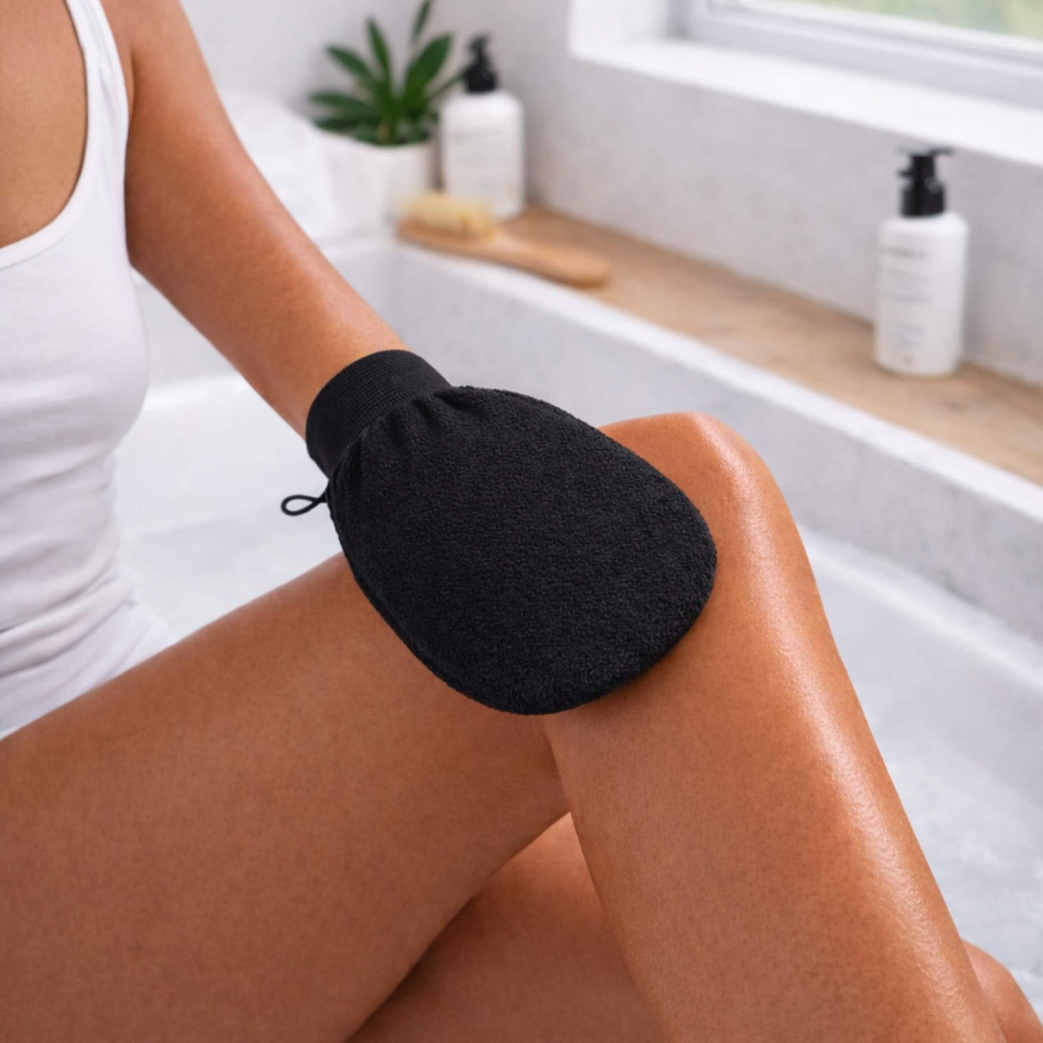 Close-up views of smooth, sun-kissed skin after applying Venice Gold premium self tanner, showcasing an even, natural-looking glow.